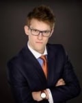 Krueger, Erik J.