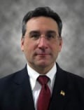 Mattioli, Mark L.