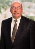 Schumacher, Miles F.