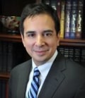 Flores, Carlos E.