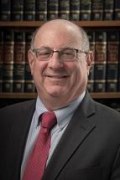 Schuster, Gary M.