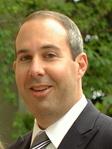 Touby, Mark A.