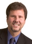 Mitchell, Greg E.