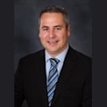 Naughton, Charles W.