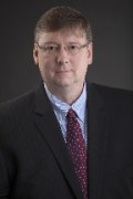 Johnson , Charles E. III (“Trip”)