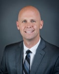 Luszeck, Jeffrey P.
