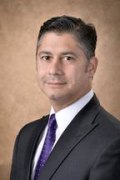 Vasvari, Thomas M.