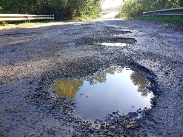 Getting Compensation for Pothole Damage to Your Car
