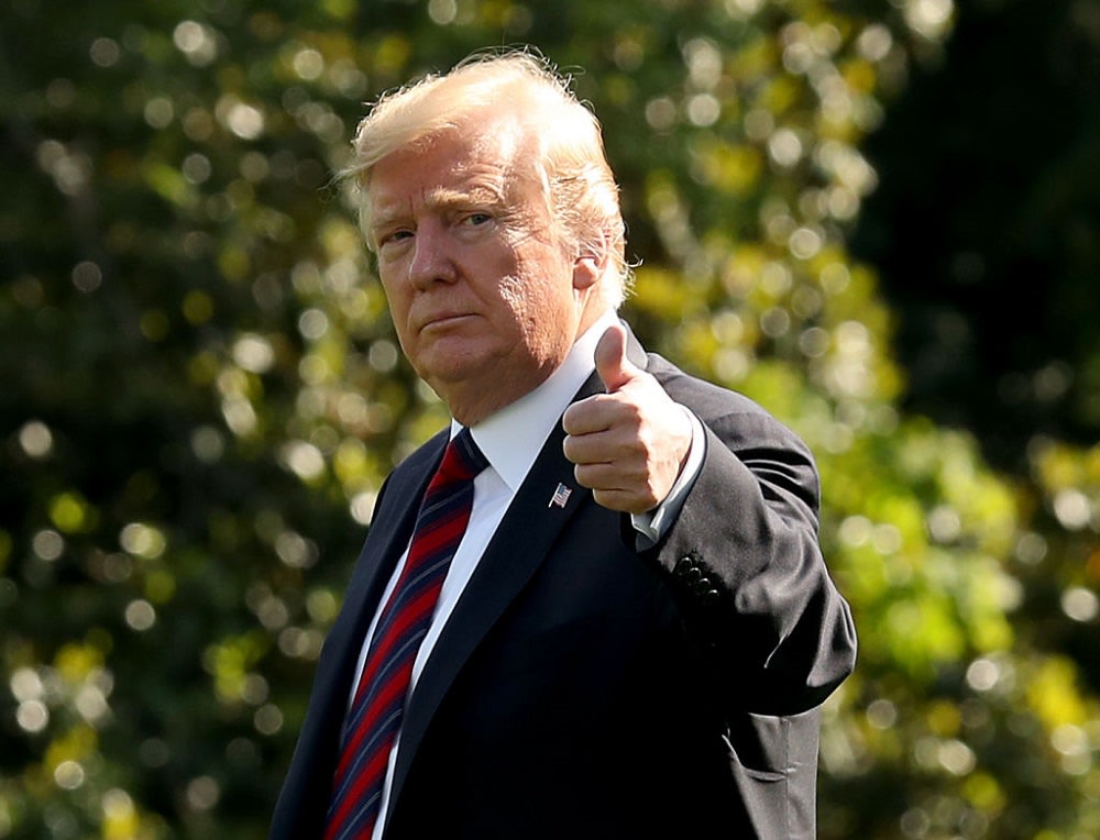 WASHINGTON, DC - MAY 16: U.S. President Donald Trump gives a thumbs up as he walks toward Marine One while departing from the White House on May 16, 2019 in Washington, DC. President Trump is traveling to New York to attend a fundraiser.   (Photo by Mark Wilson/Getty Images)