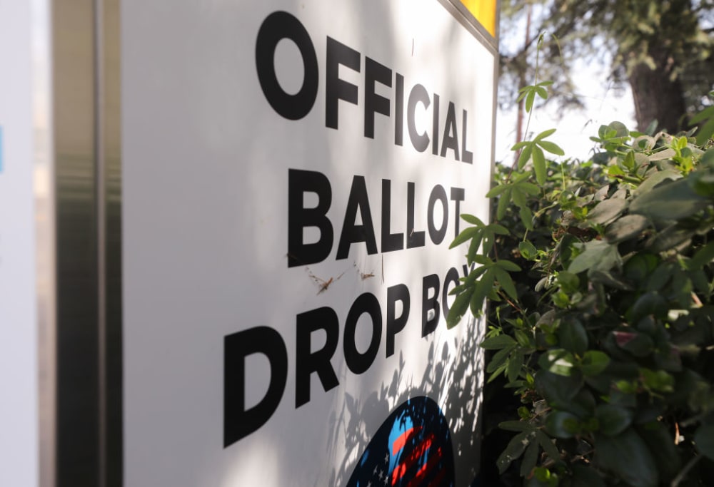 LOS ANGELES, CALIFORNIA - OCTOBER 05:  An official mail-in ballot drop box is posted outside of a library ahead of Election Day on October 5, 2020 in Los Angeles, California. Early voting has begun in California with Los Angeles County posting 400 secure vote-by-mail drop boxes across the county. (Photo by Mario Tama/Getty Images)