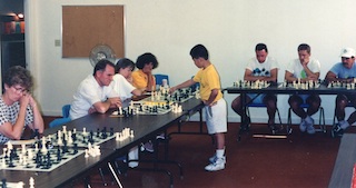 Beth vs 12 Players, Simul Chess Scene