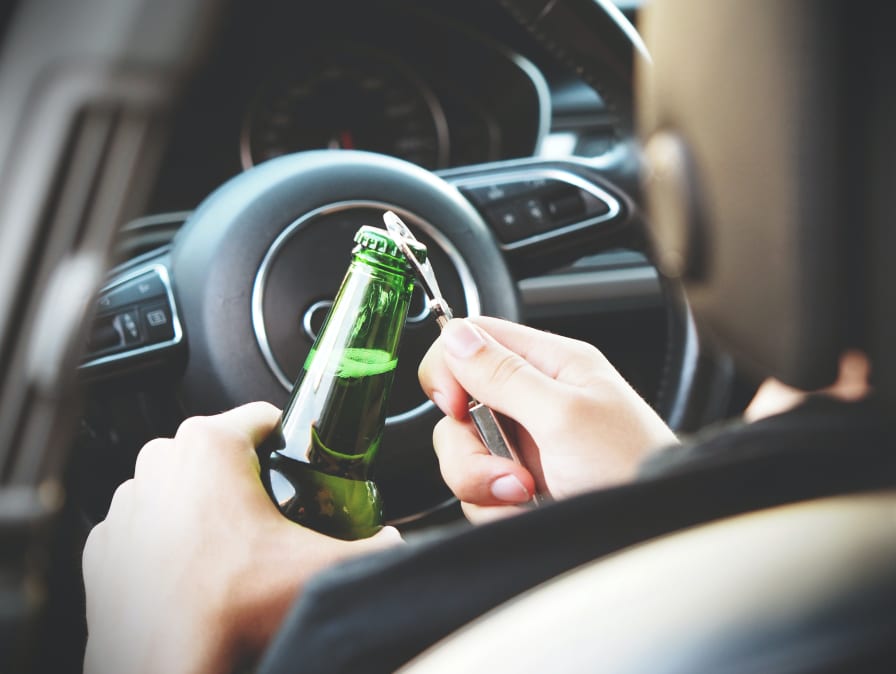 Can You Drive With an Open Bottle of Liquor? Legal Insights