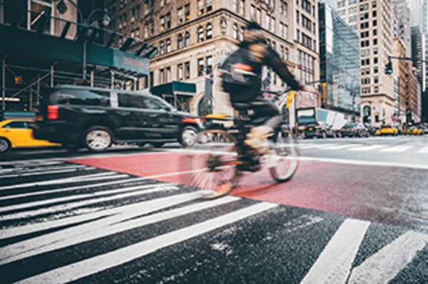 Should It Be Legal for Cyclists to Roll Through Stop Signs?