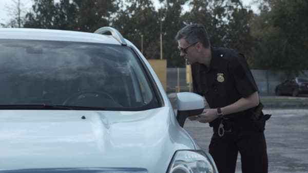 How Far Do I Have To Roll Down My Window at a Traffic Stop?